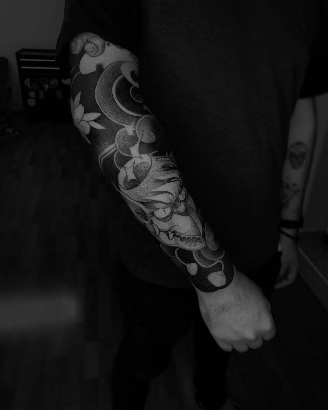 Dotwork tattoo sleeve design for men