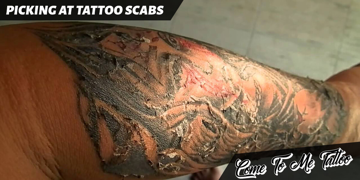 Picking at tattoo scabs.