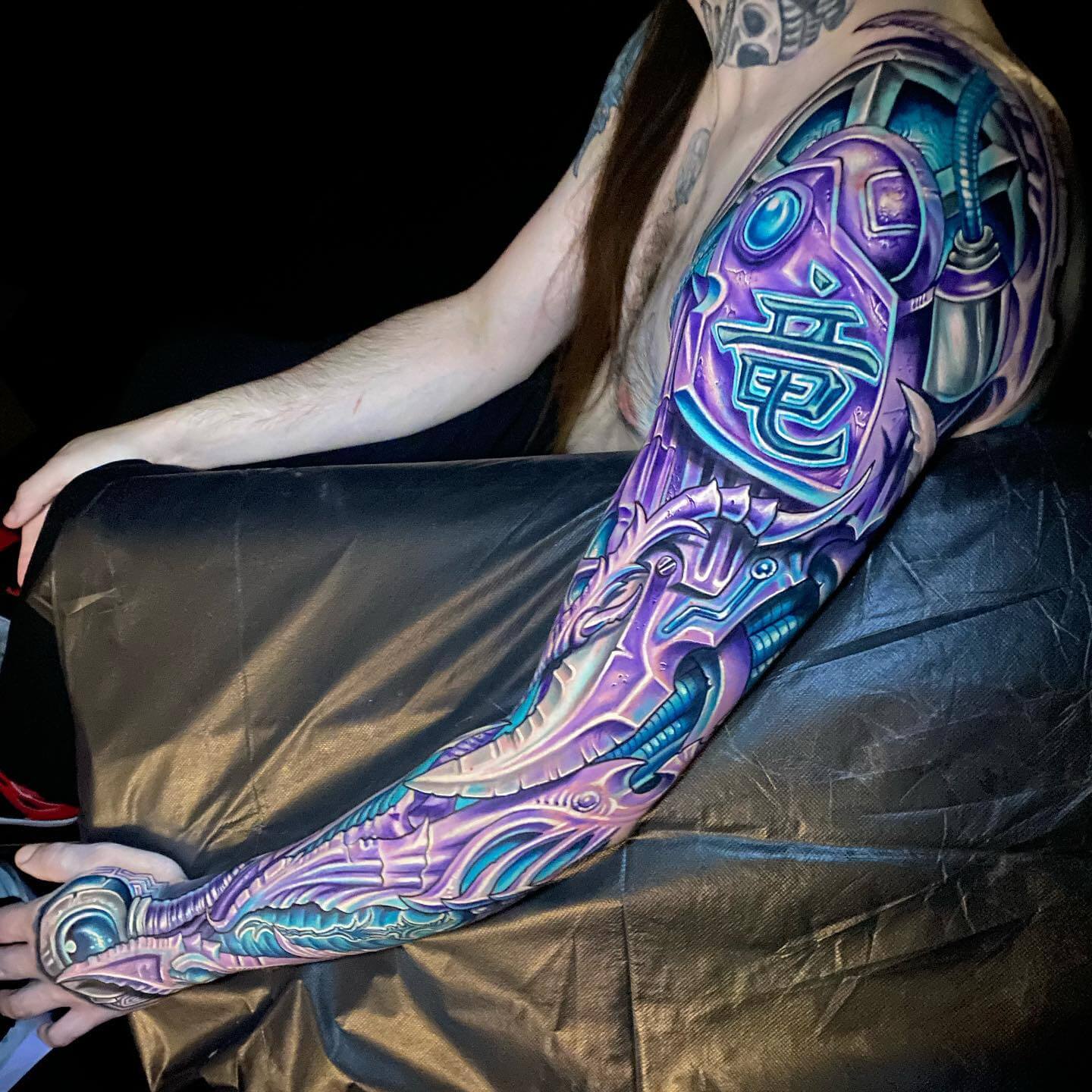 biomechanical sleeve tattoo