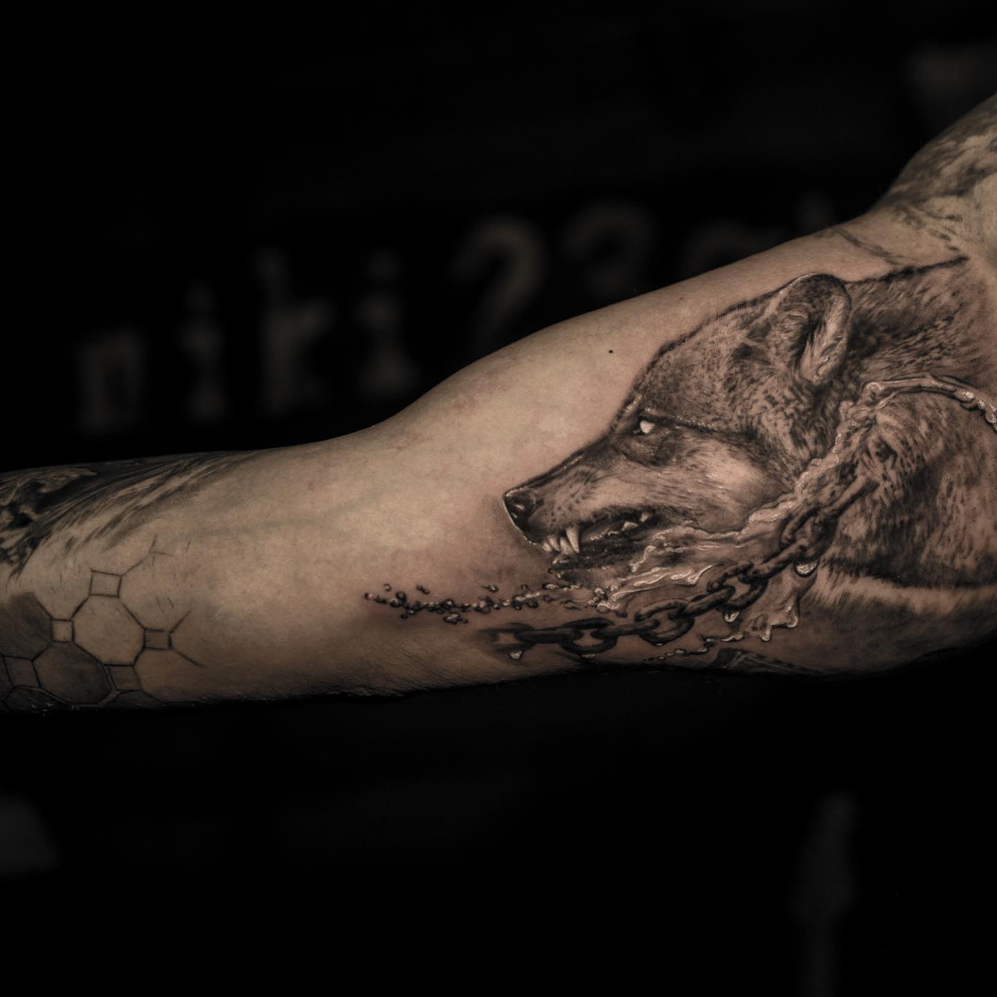 black and grey realism tattoo wolf