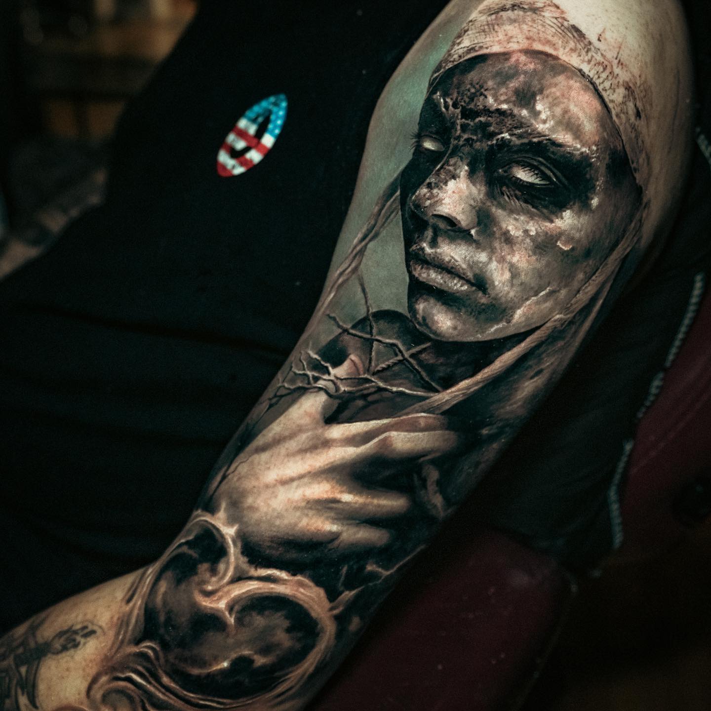black and grey realistic tattoo sleeve