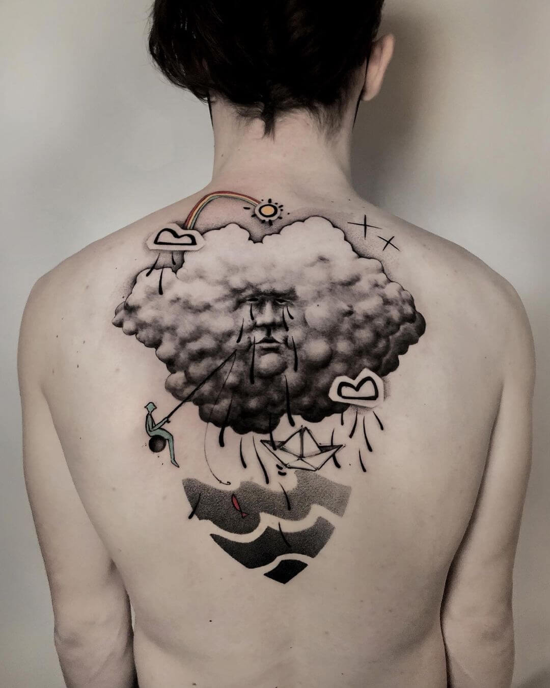black and grey surrealism tattoo back