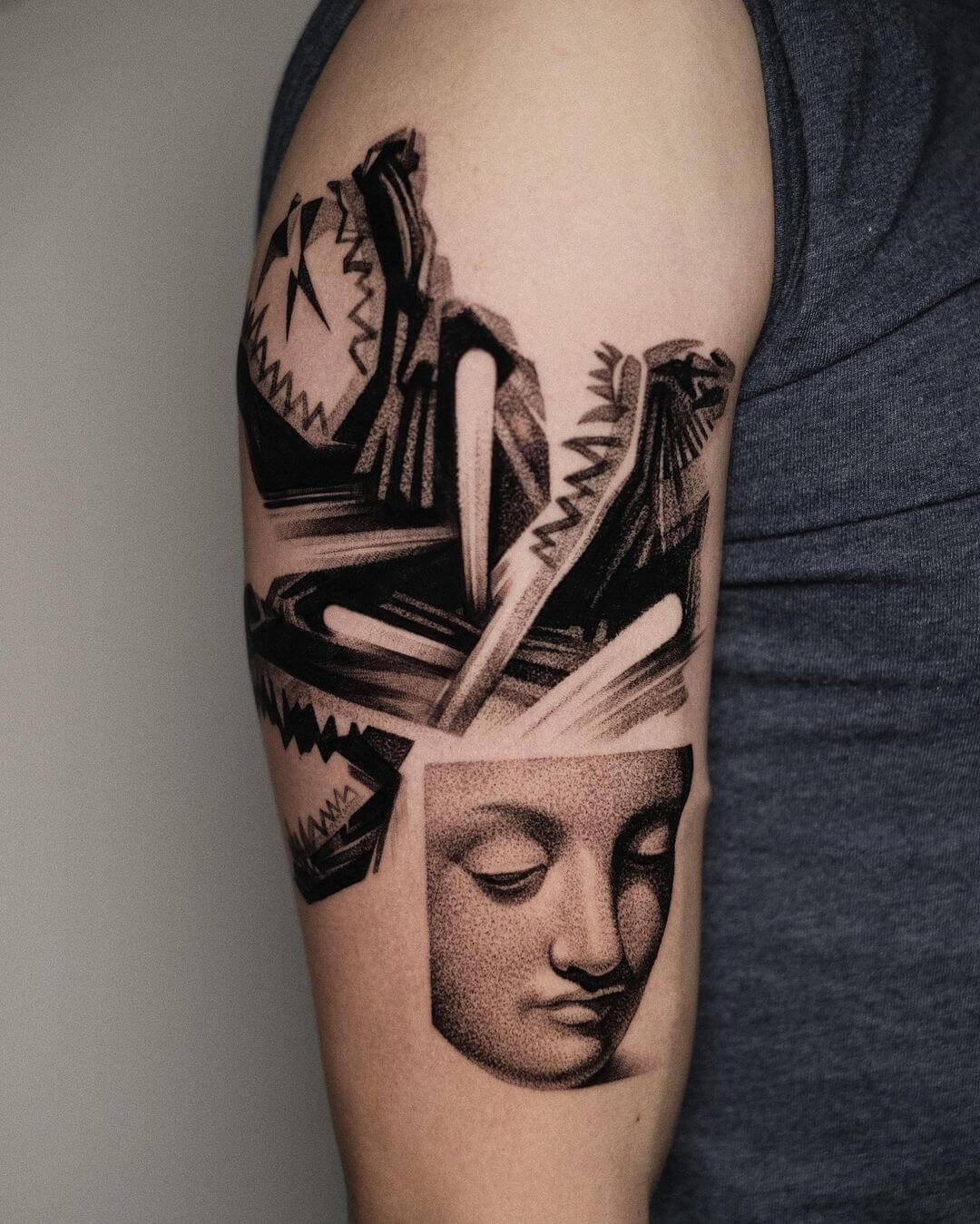 black and grey surrealism tattoos