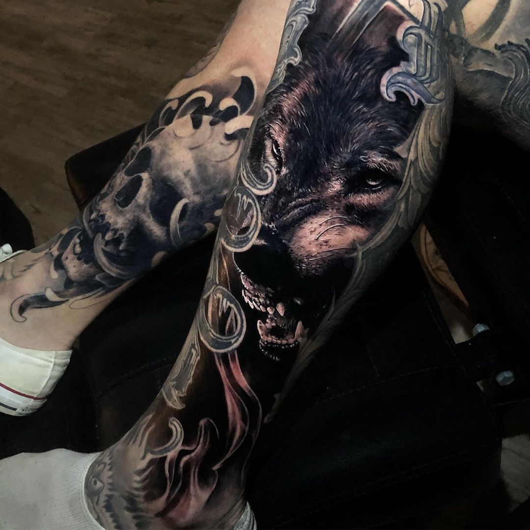 black and grey wolf realism tattoo