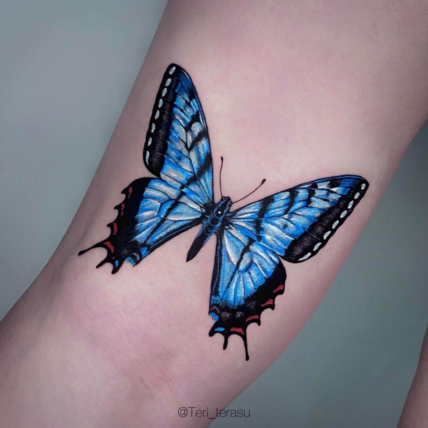 blue butterfly meaning tattoo