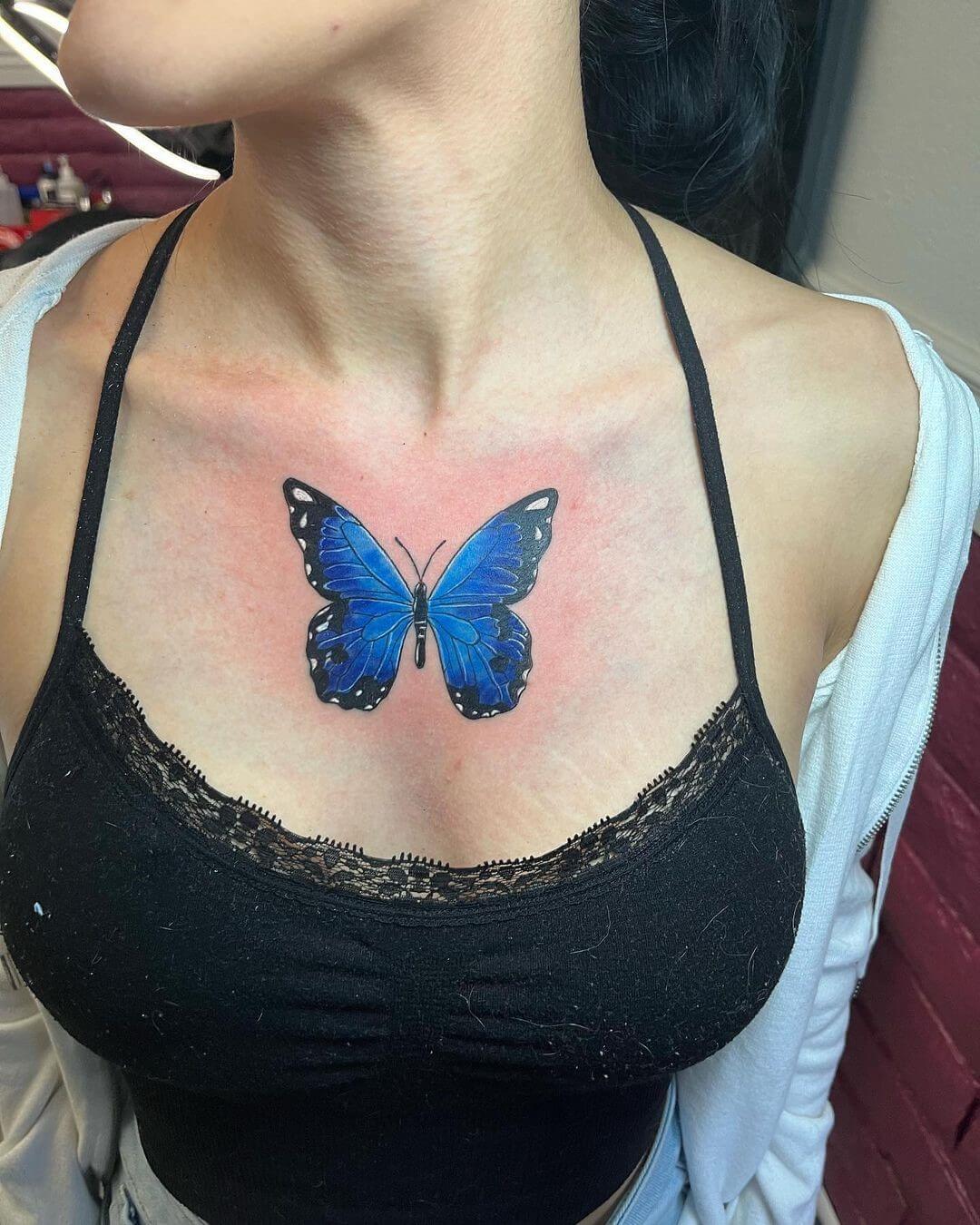 blue butterfly tattoo chest
