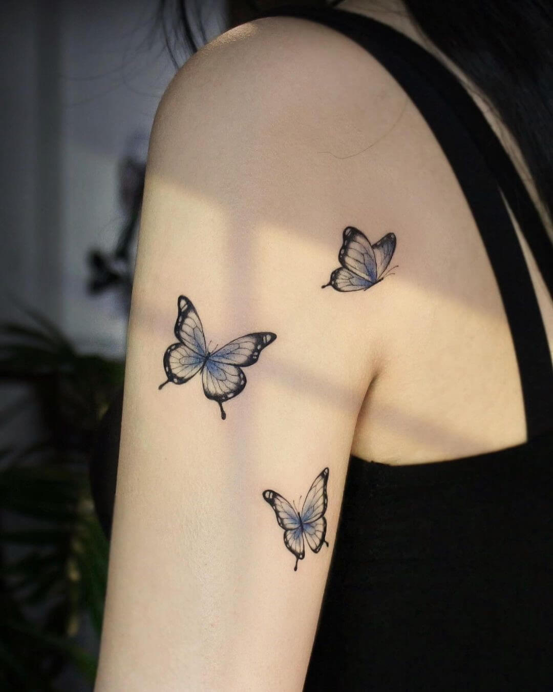 blue butterfly tattoo shoulder