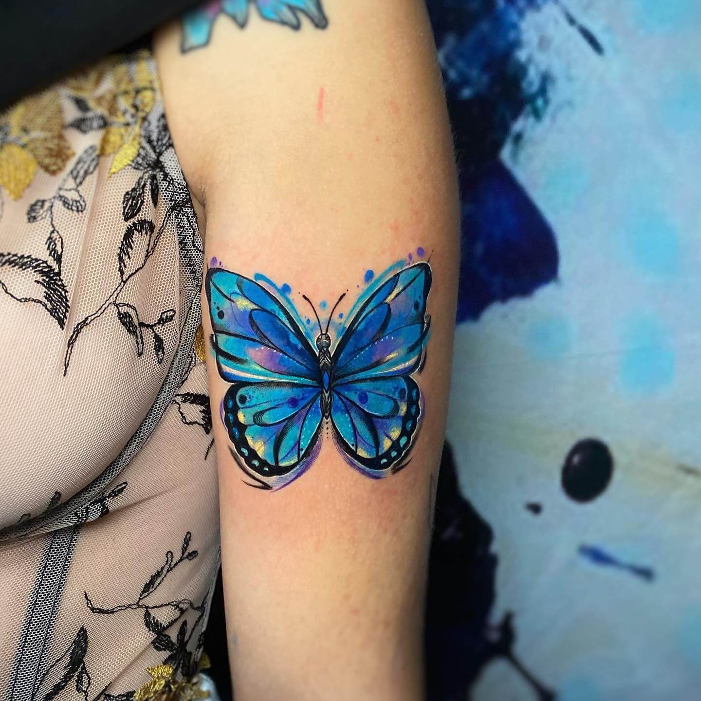 Blue Watercolor Butterfly Tattoo on Arm
