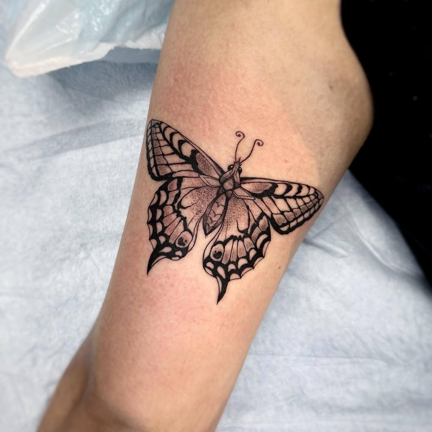 butterfly hand tattoo meaning