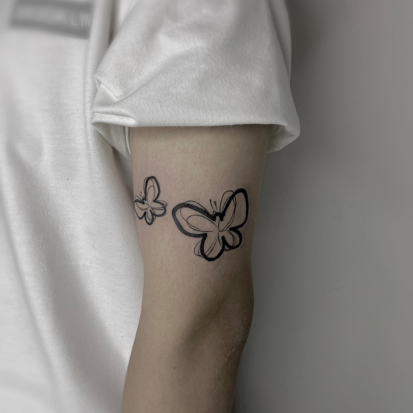 butterfly on hand tattoo