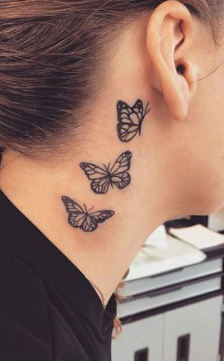 butterfly on side neck tattoo