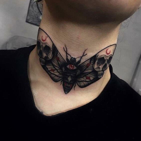 butterfly tattoo on front of neck