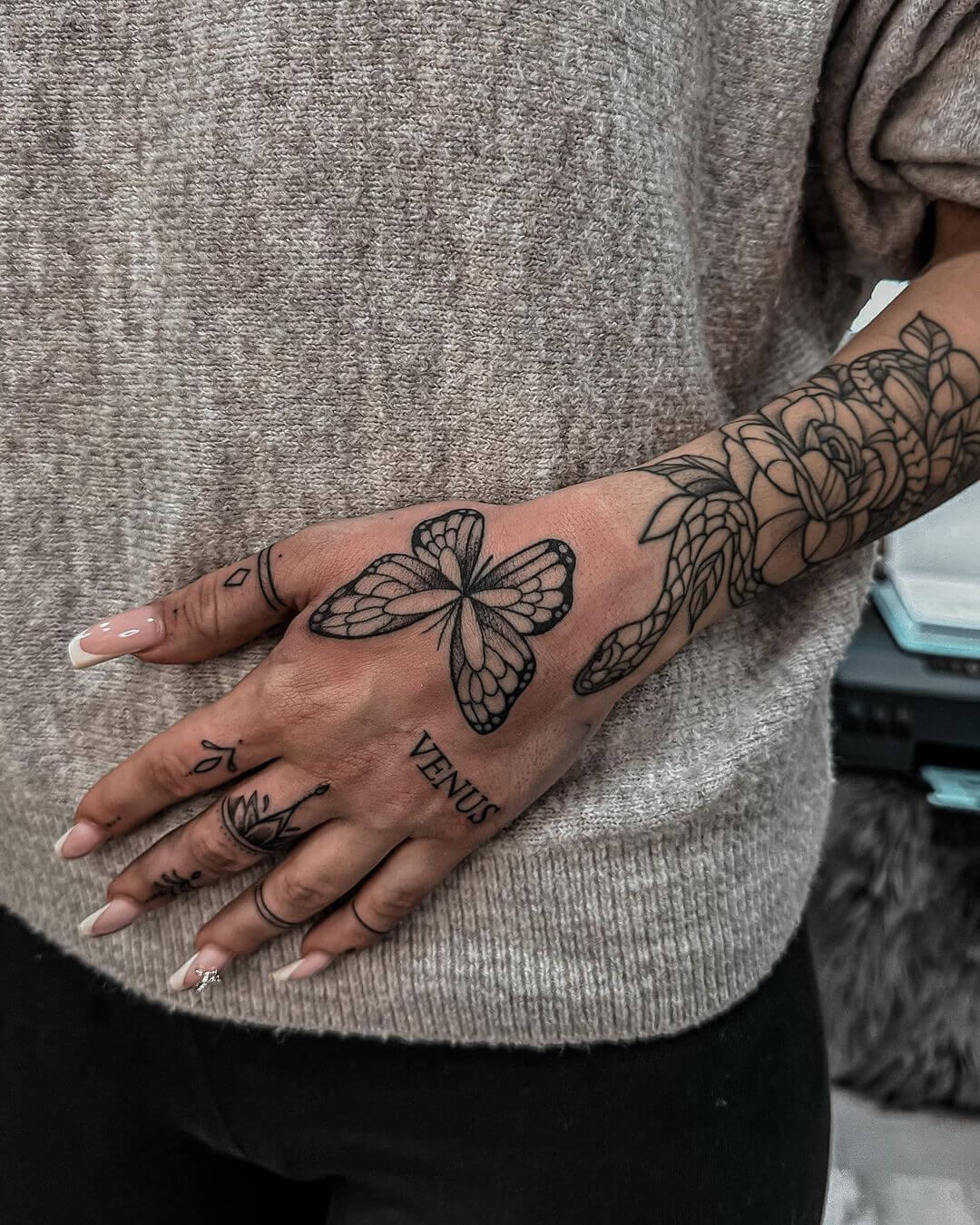 butterfly tattoo on hand meaning