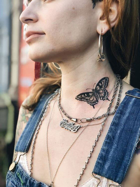 butterfly tattoo on neck girl