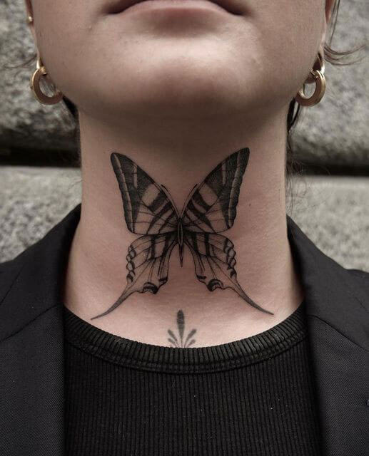 butterfly tattoo on neck