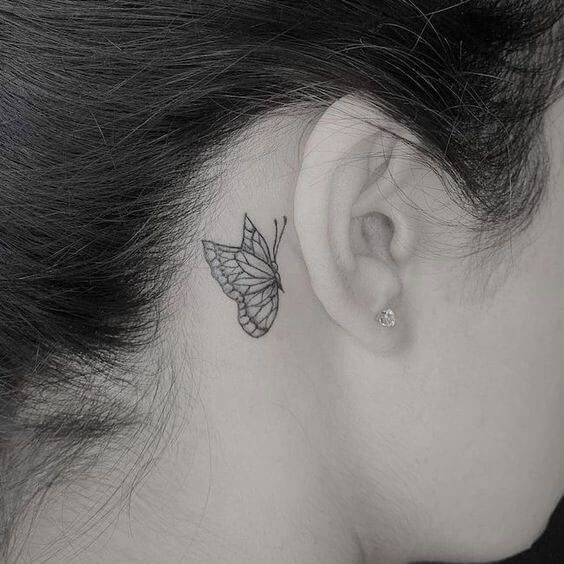 butterfly tattoo on side neck