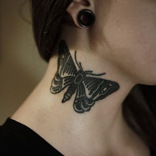 butterfly tattoo on side of neck