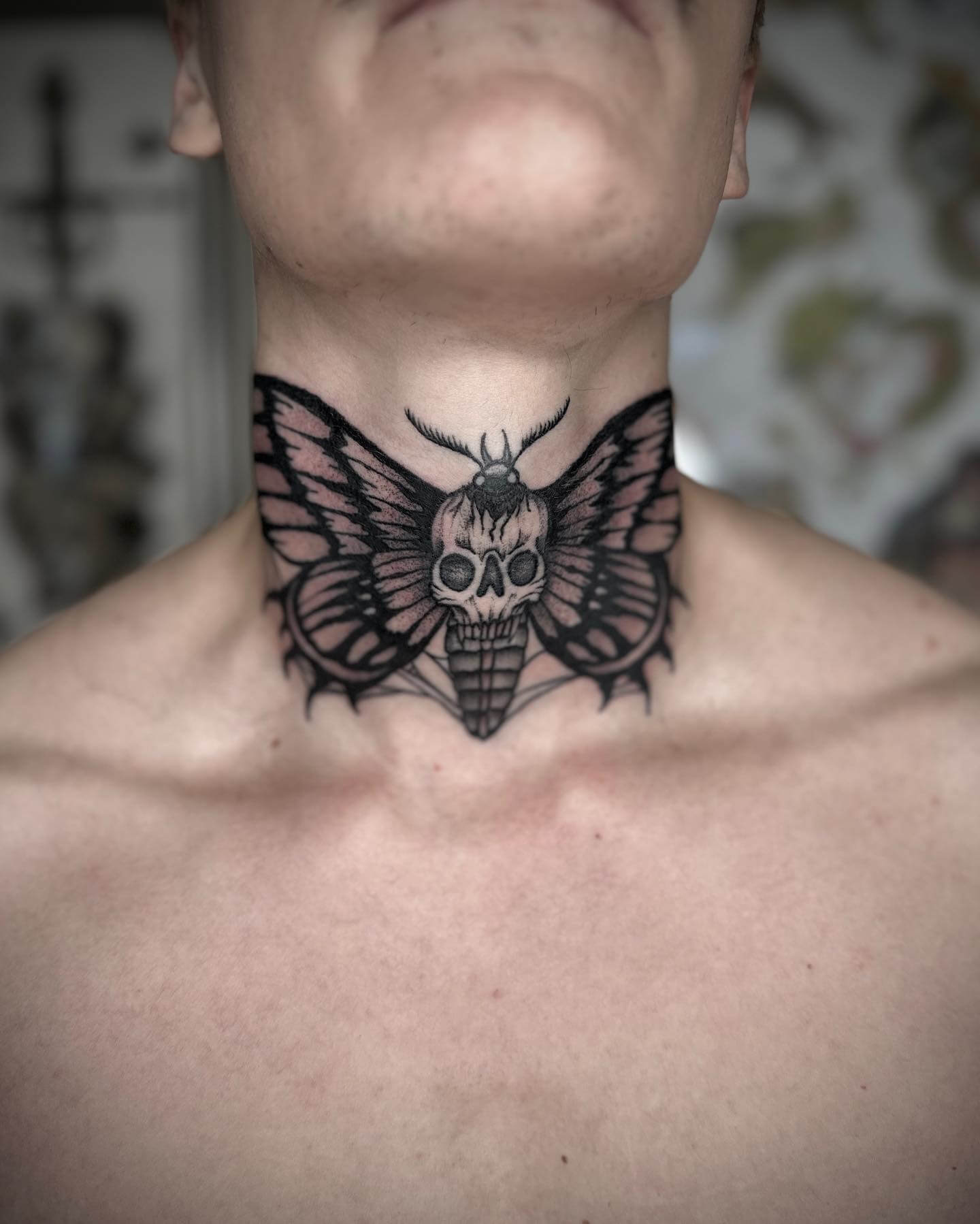 Amzaing Butterfly skull neck tattoo