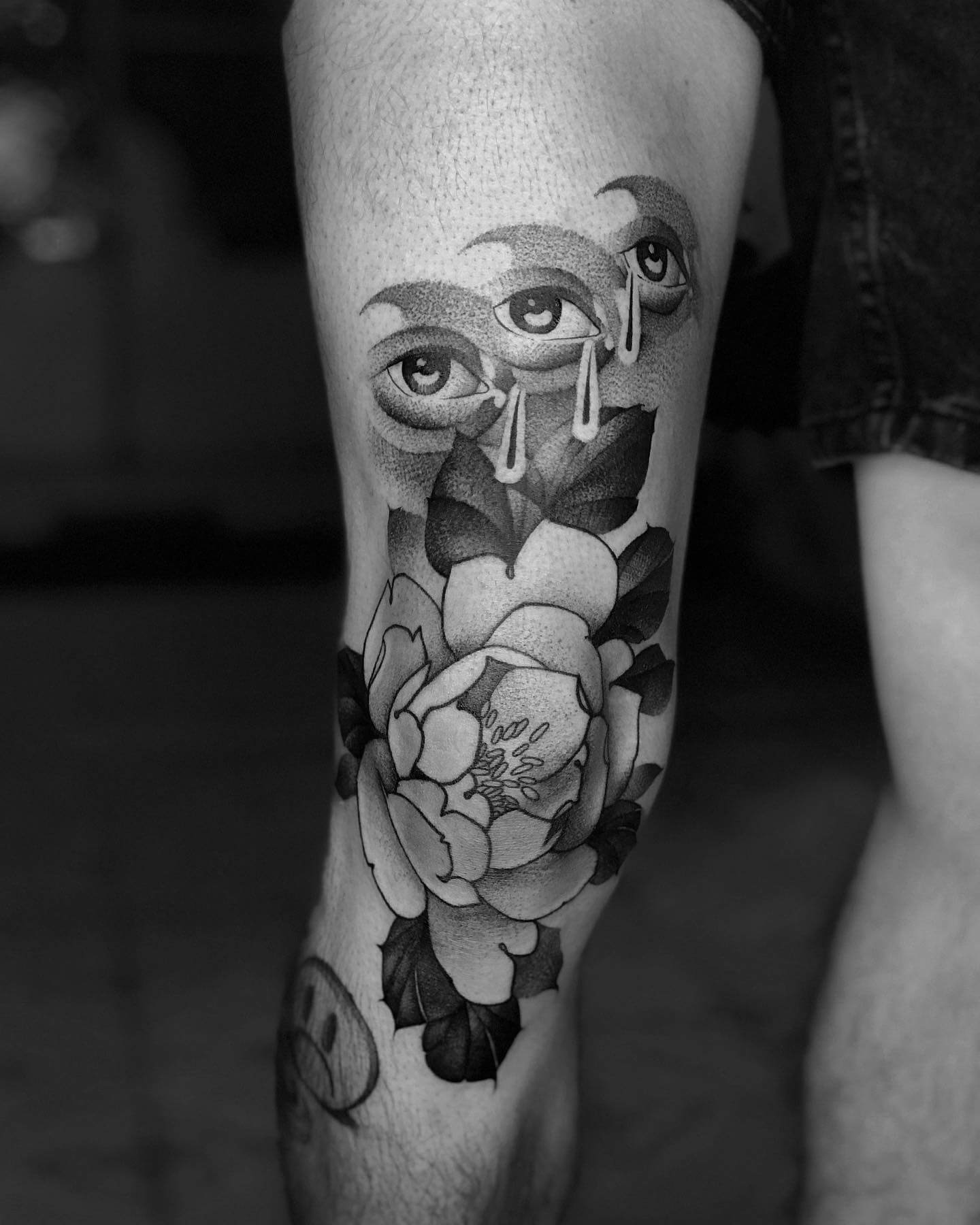 dotwork flower tattoo.
