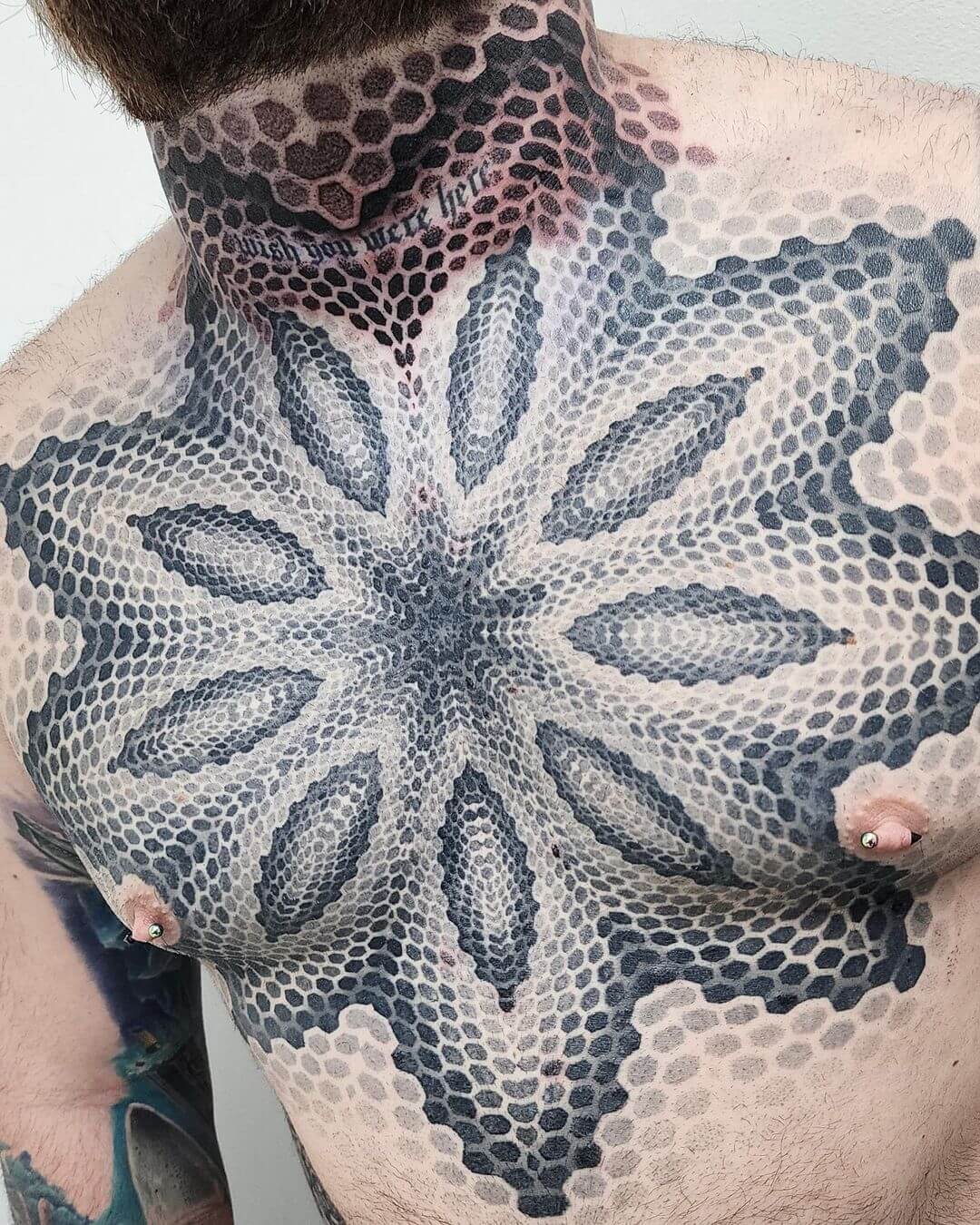 dotwork tattoo chest.