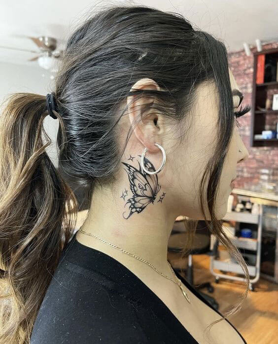 female butterfly neck tattoo