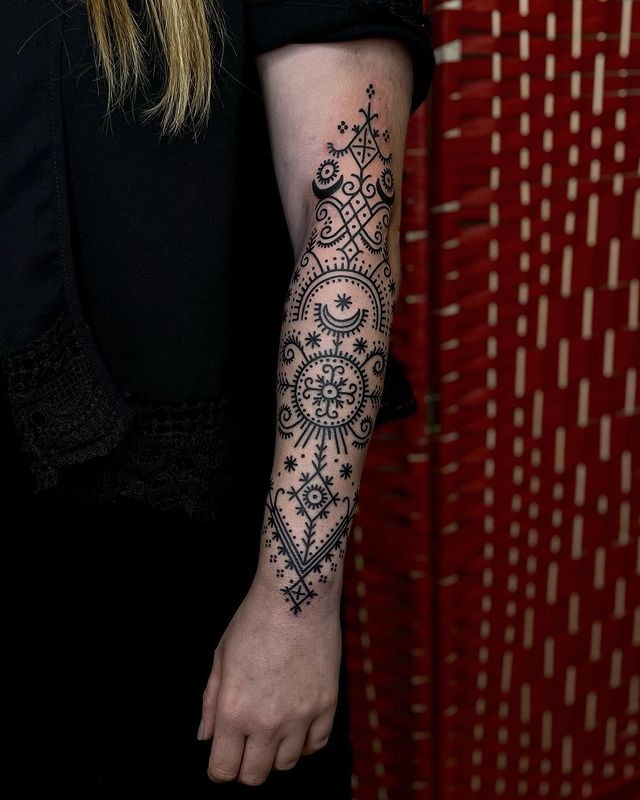female ornamental tattoo hand
