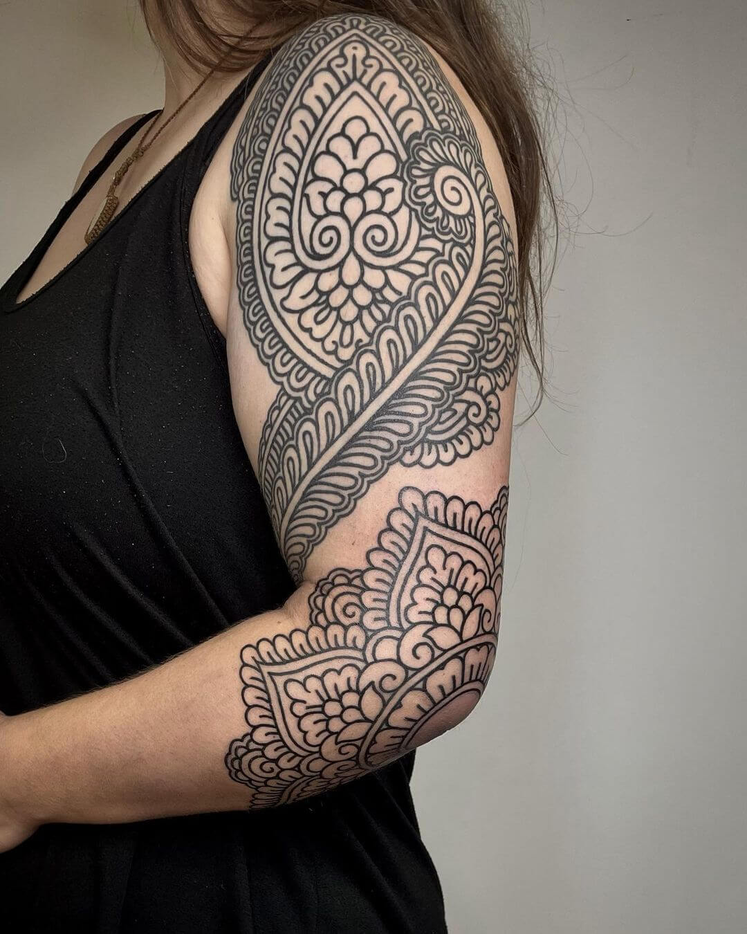 female ornamental tattoo sleeve