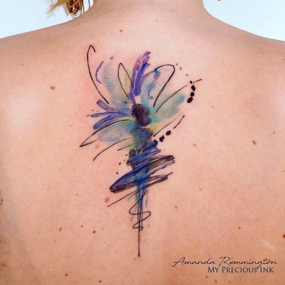 feminine small watercolor tattoo.