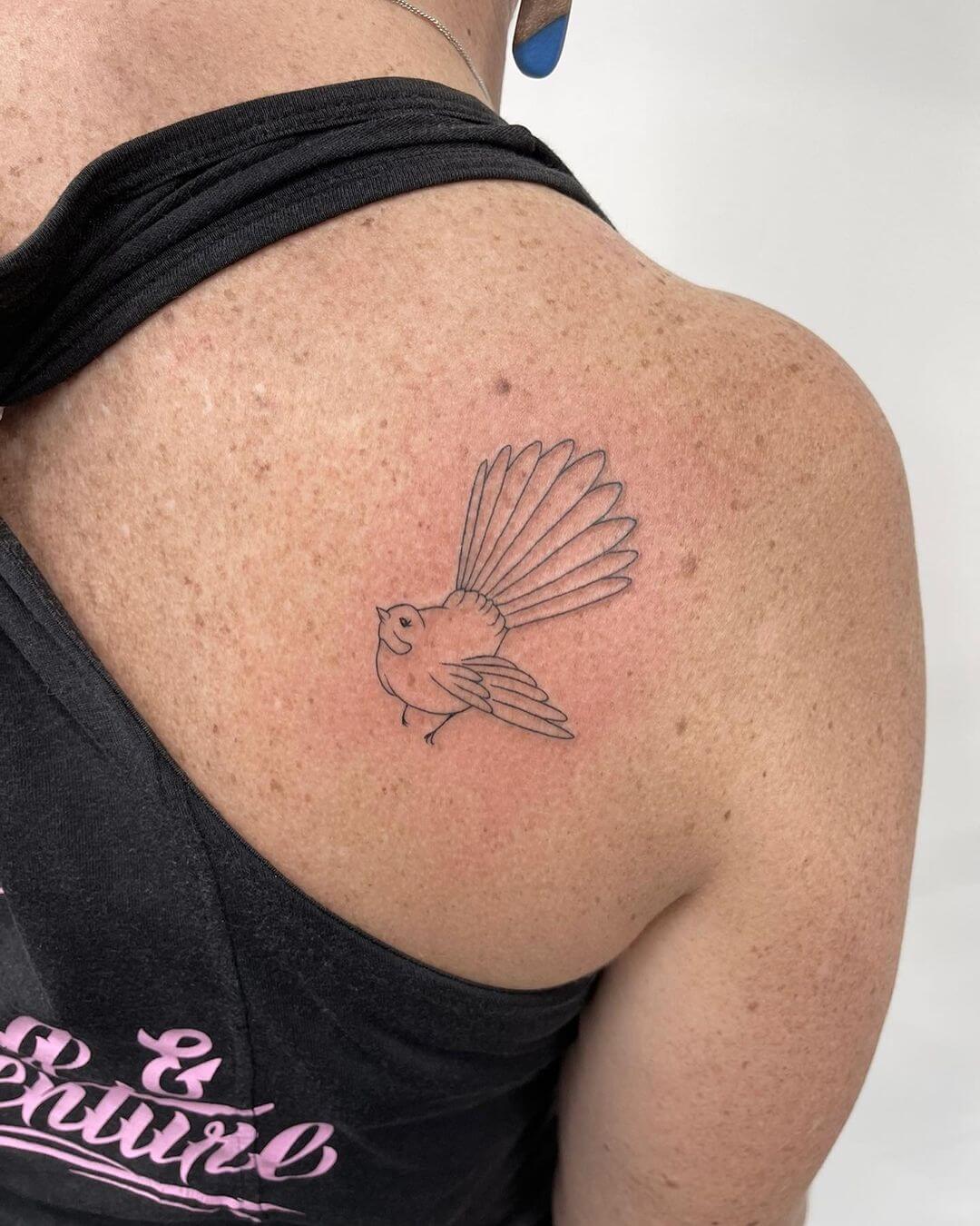 fine line tattoo bird.