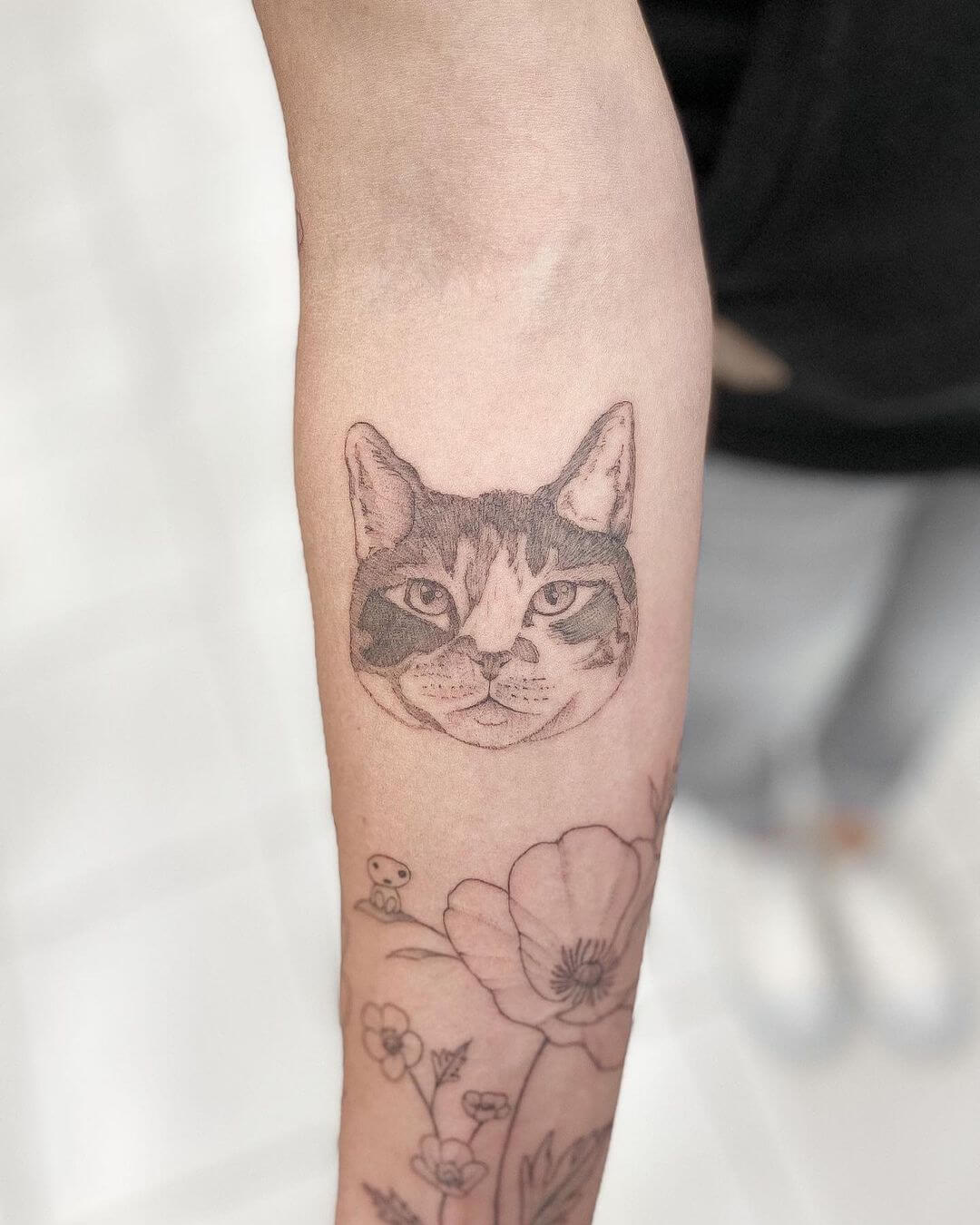 fine line tattoo cat.