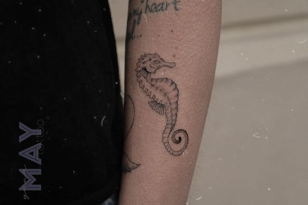 fine line tattoo seahorse.