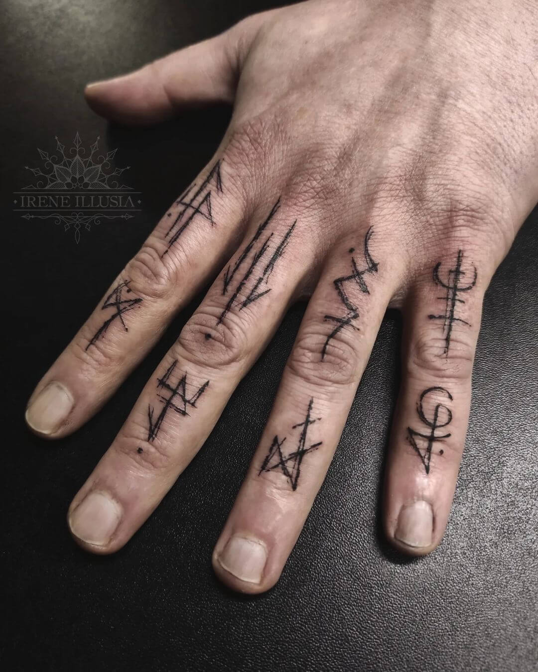 A Man With A New Finger Tattoo High-Res Stock Photo - Getty Images