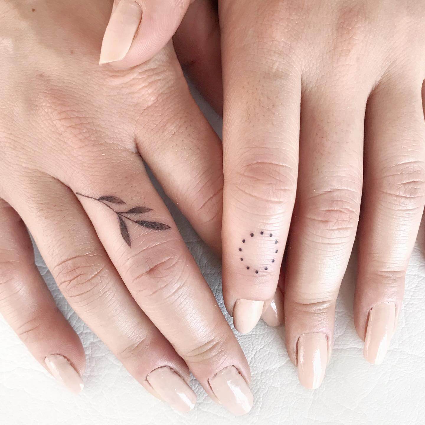 Photo of Flower Tattoos on Person's Right Hand · Free Stock Photo
