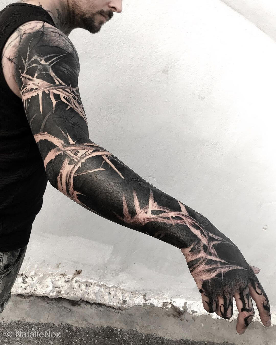forearm blackwork tattoo