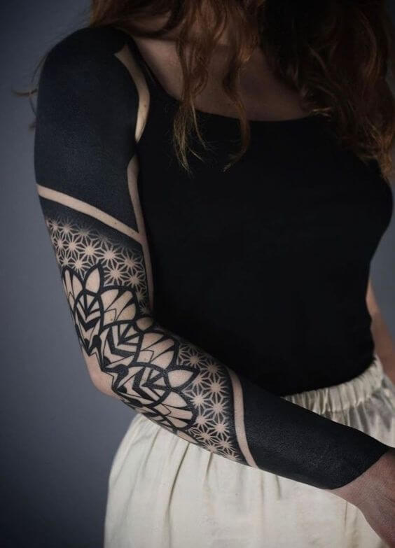 geometric blackwork tattoo