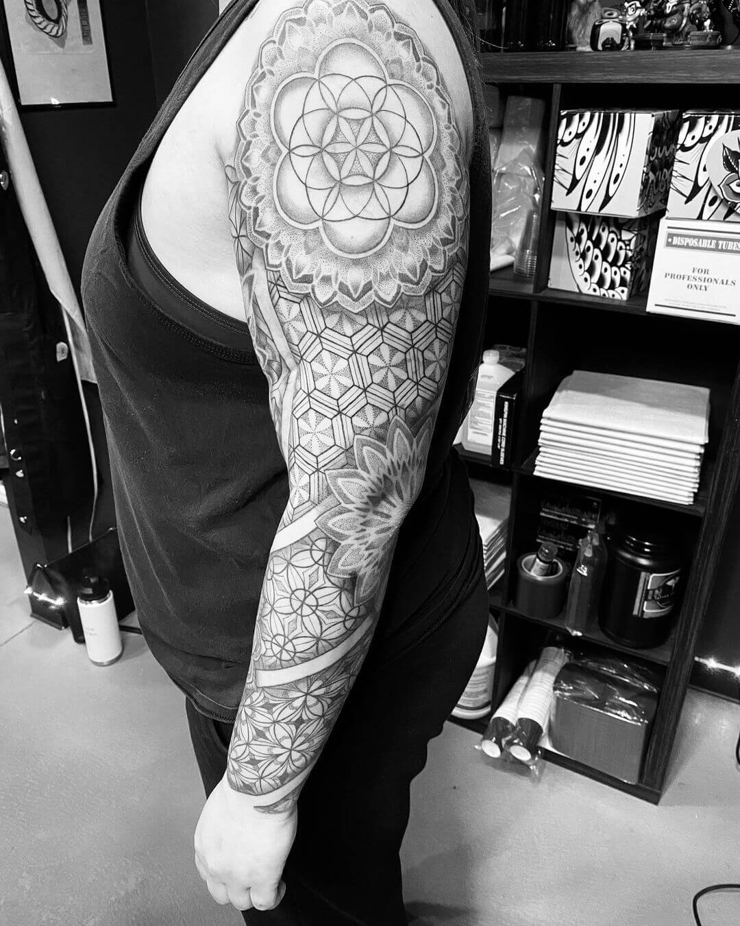 geometric forearm sleeve tattoo