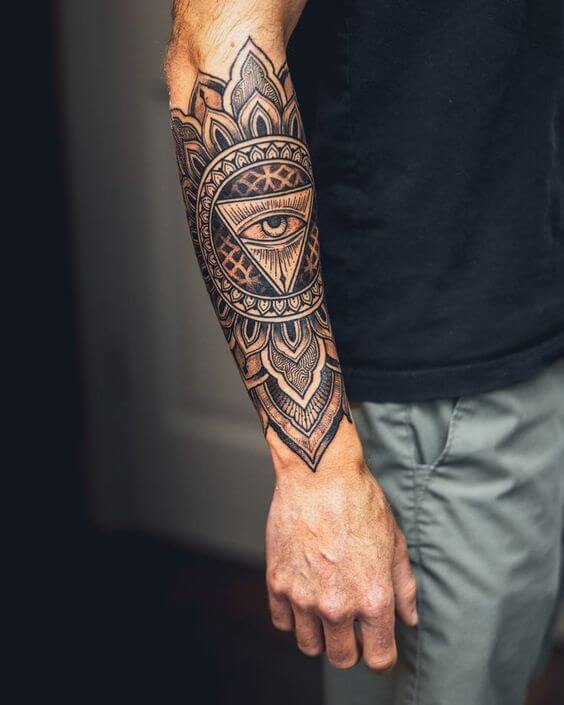 geometric mandala shoulder tattoo men
