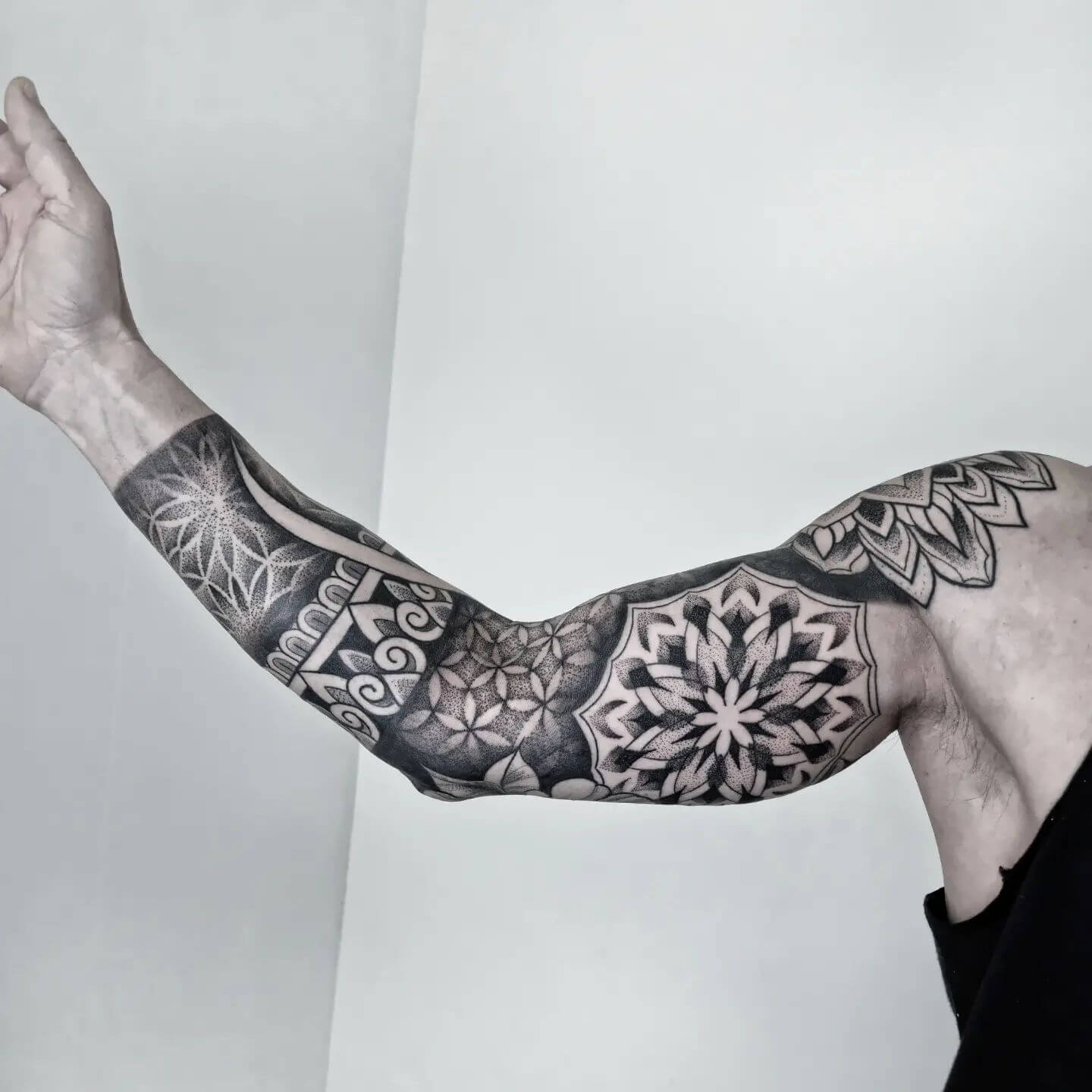 geometric tattoo half sleeve
