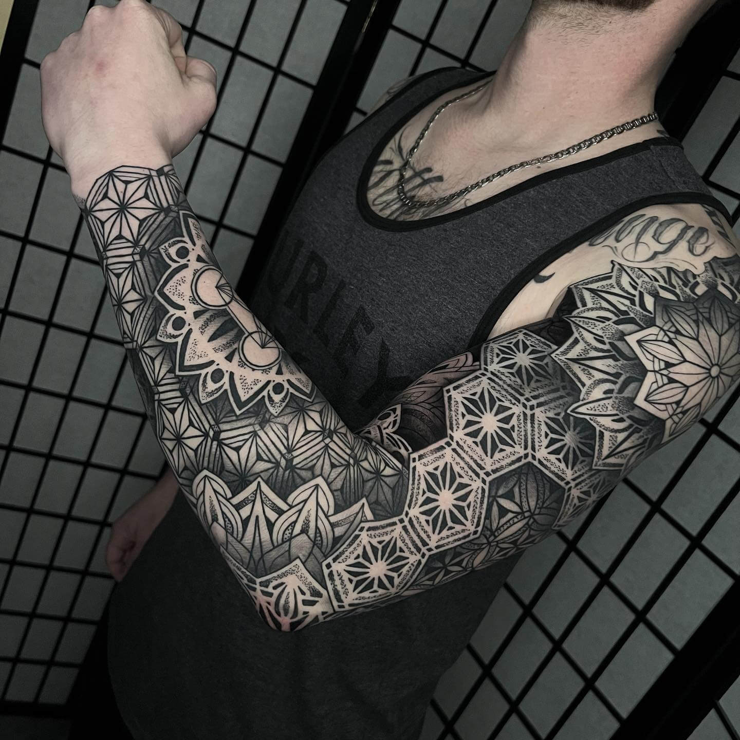 geometric tattoo sleeve men