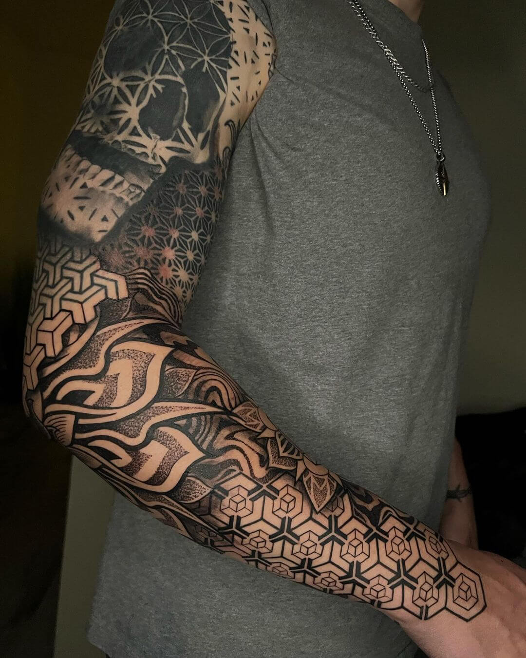 geometric tattoo sleeve skull