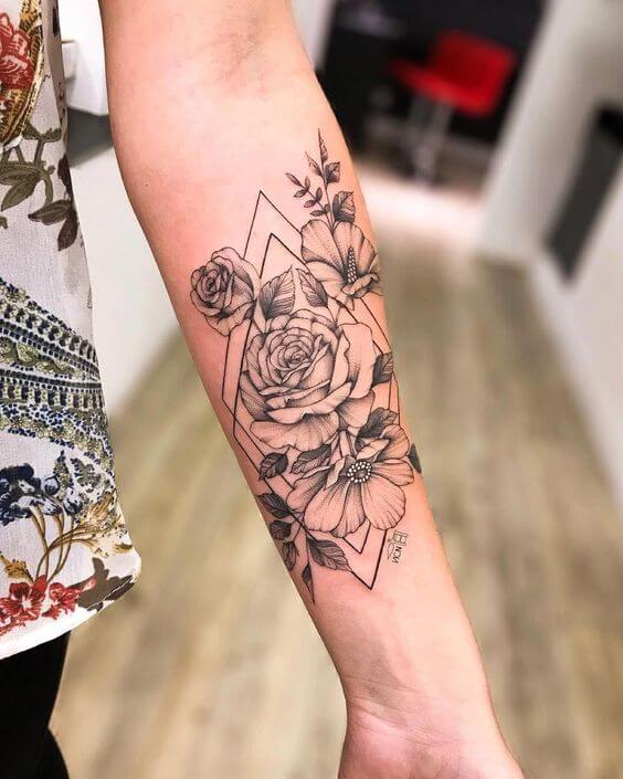 geometric traditional flower tattoo