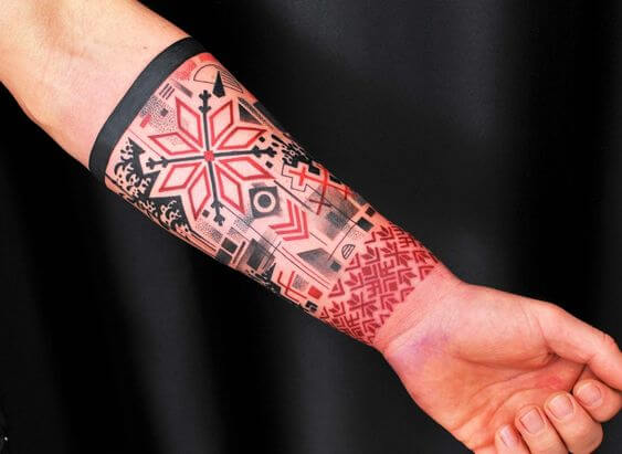geometric trash polka forearm tattoo.