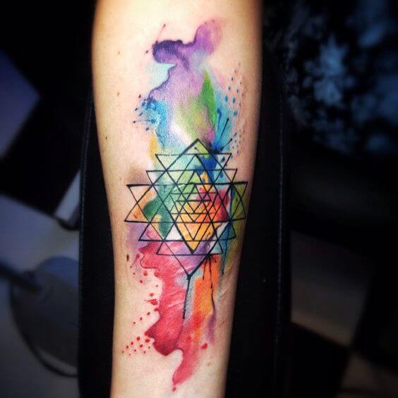 geometric watercolor tattoo.