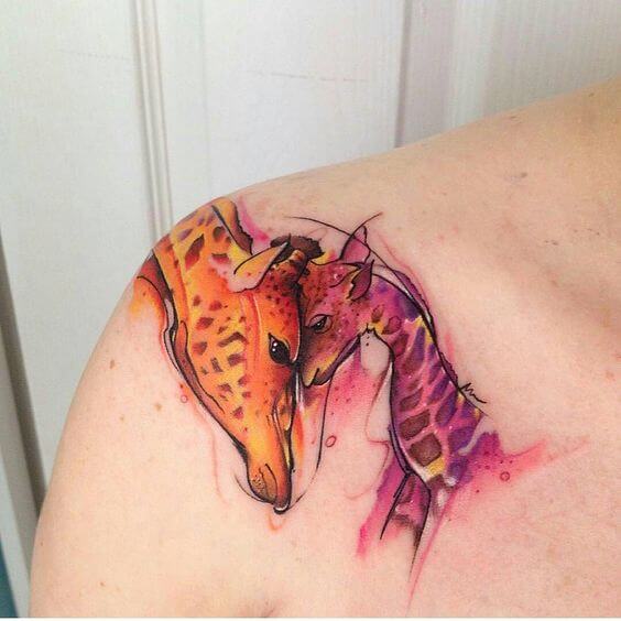 giraffe watercolor tattoo.