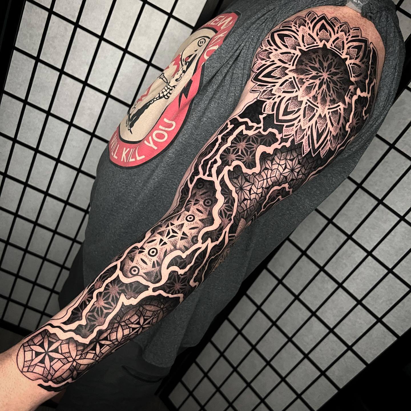 half sleeve geometric tattoo