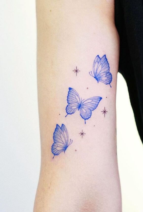 light blue butterfly tattoo