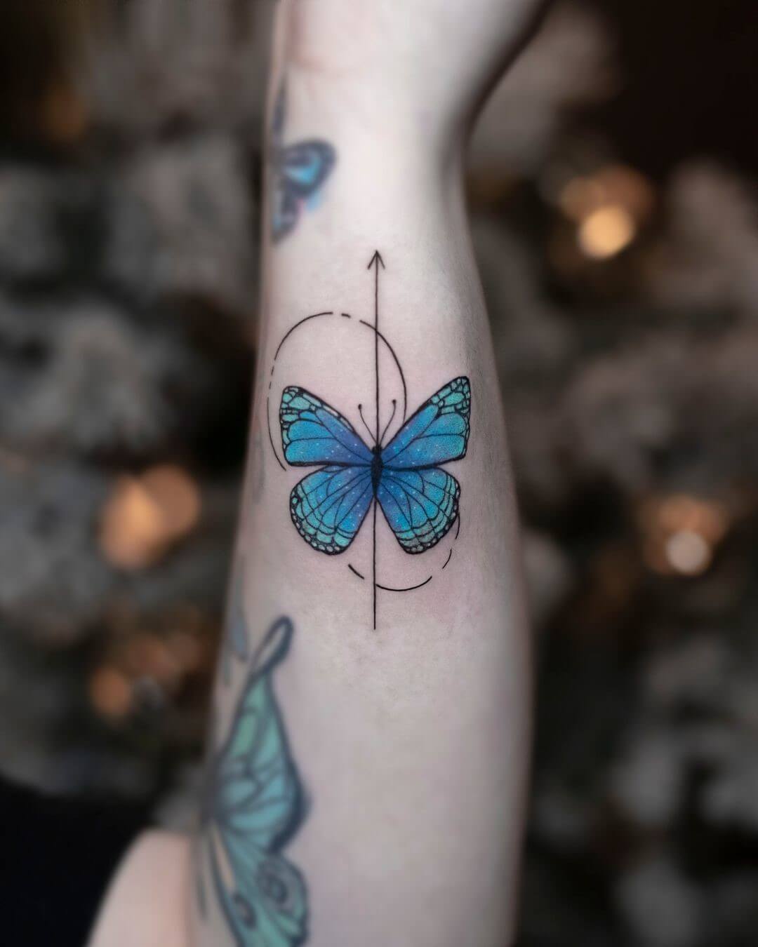 little blue butterfly tattoo