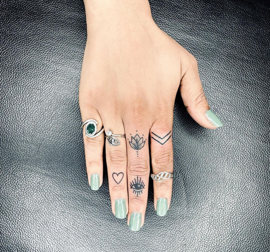 Tiny Modern Studio on Instagram: “Dainty finger tattoos to represent her  family and life 🖤 .… | Hand and finger tattoos, Tiny tattoos for women,  Small hand tattoos