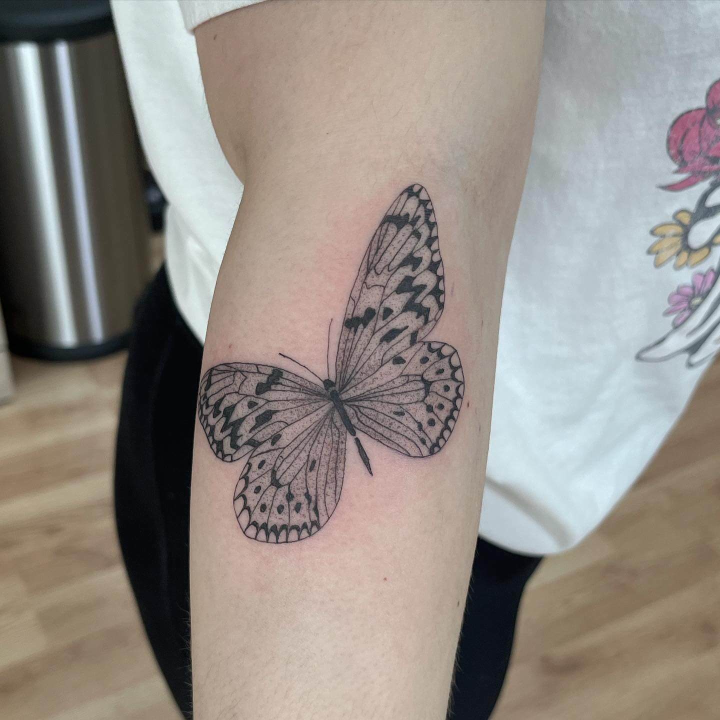 matching butterfly hand tattoo