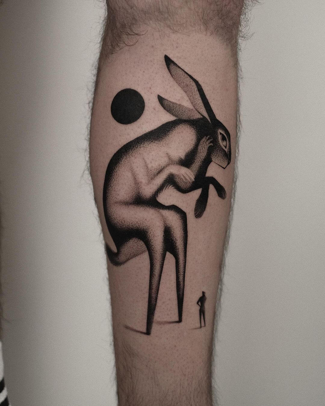 minimalist surrealism tattoo design